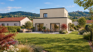Maison contemporaine et jardin bucolique ensoleillé